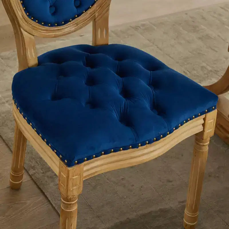Chaises de salle à manger capitonnées de style français