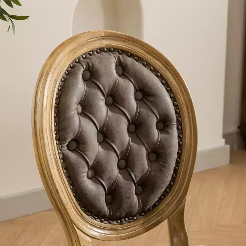 Chaises de salle à manger capitonnées de style français