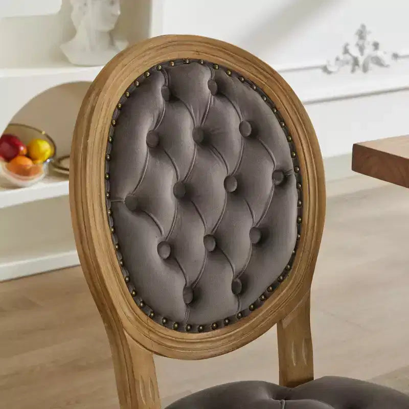 Chaises de salle à manger capitonnées de style français