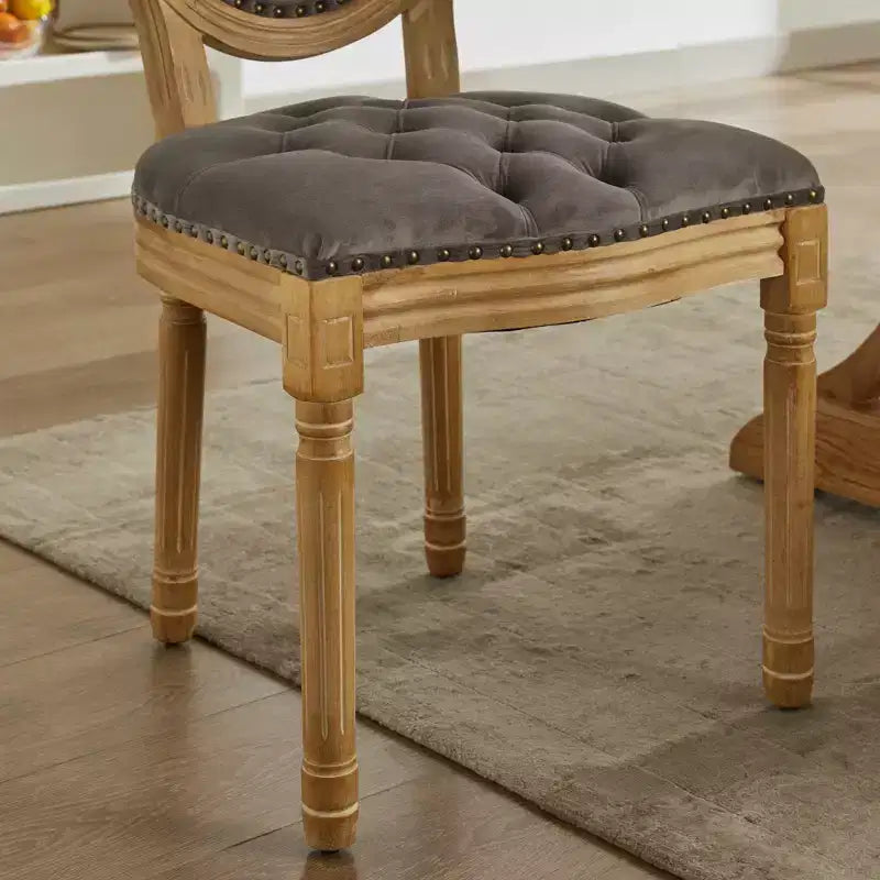 Chaises de salle à manger capitonnées de style français