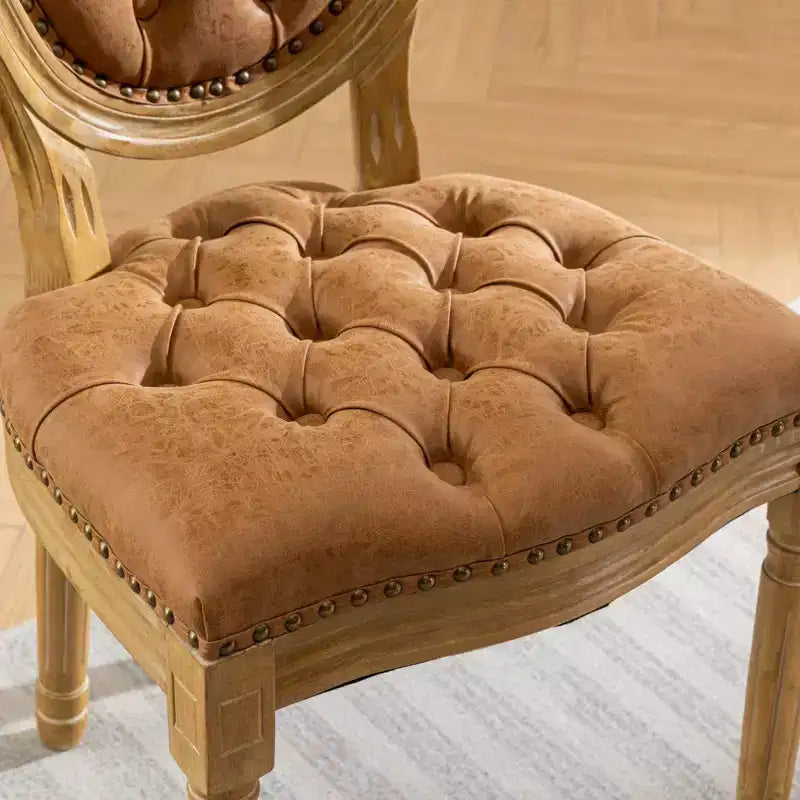 Chaises de salle à manger capitonnées de style français