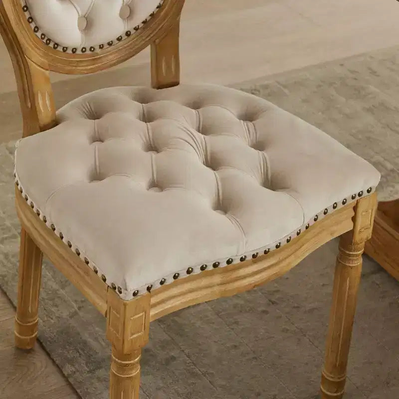 Chaises de salle à manger capitonnées de style français